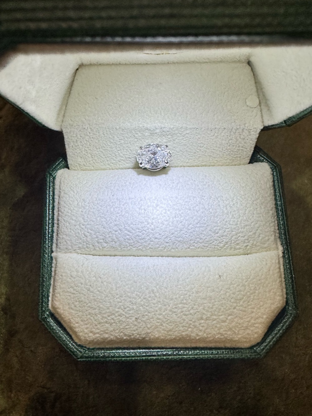 White gold 3 carat Lab Grown diamond stud set in 18k gold! Oval shape